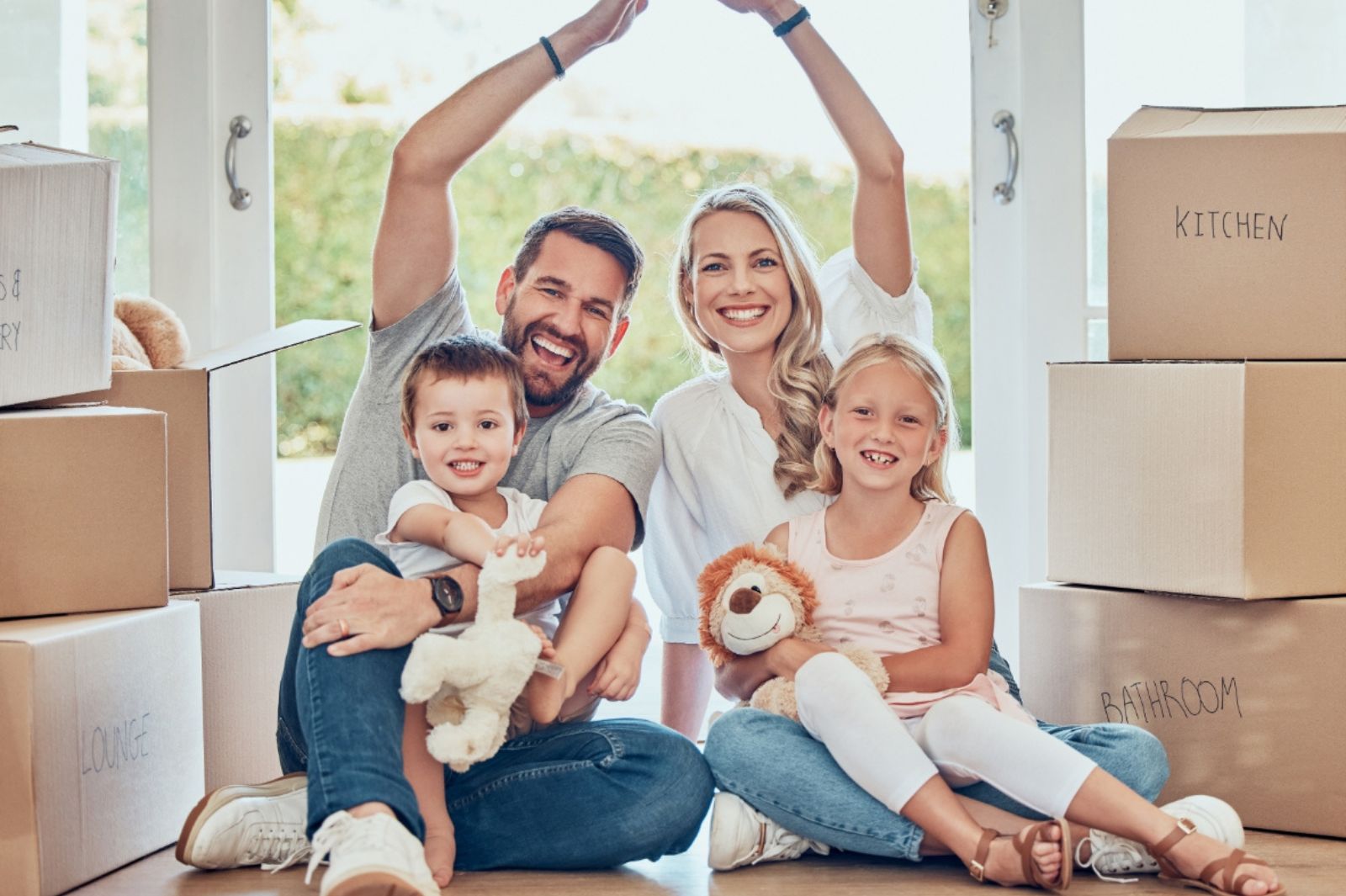 Portrait of happy family, new home and roof for security, safety and future investment in real estate